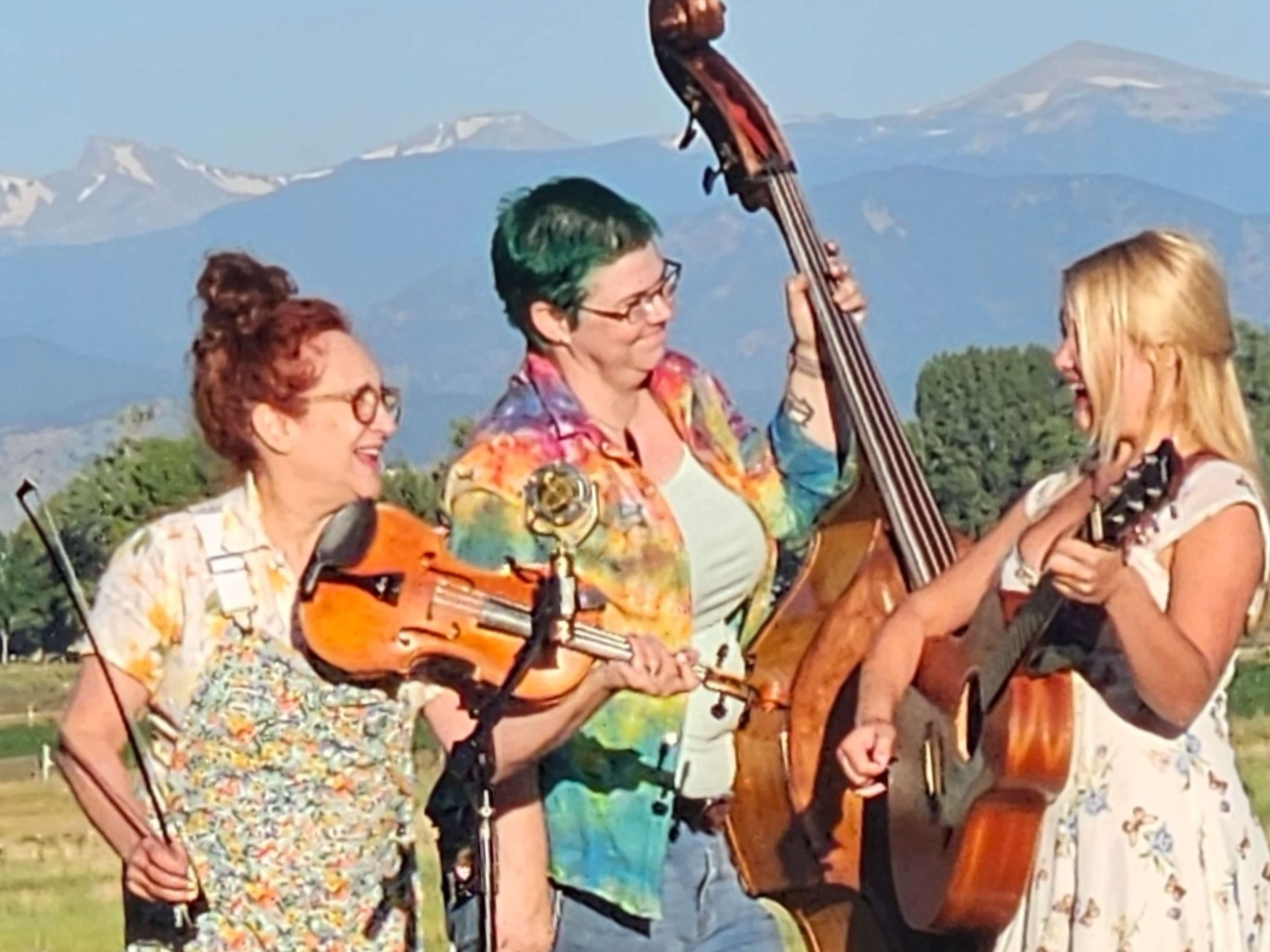 5-Foot Betty smiling with mountains behind us